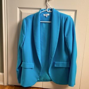 Oversized turquoise blazer.